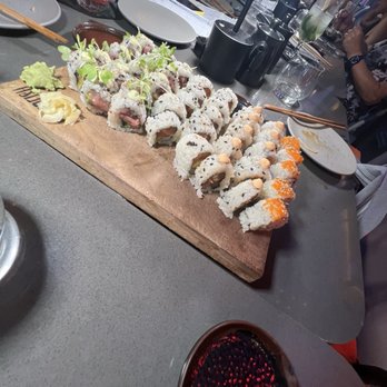 Paperfish Sushi - L to R - Hamachi Jalapeno roll, NY roll, Spicy Tuna roll, California roll - Japanese Near Me - Miami Beach, Florida Paperfish Sushi - L to R - Hamachi Jalapeno roll, NY roll, Spicy Tuna roll, California roll - Japanese Near Me - Miami Beach, Florida