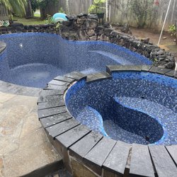 Fisher's Pool Cleaning Services - New pool my crew tiled, glass waterline.
