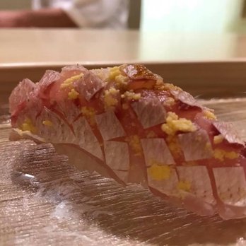 Kenzo Napa - This is an example of Kenzo's extraordinary sushi...not your usual nigiri! Egg cooked in mirin (sweet rice wine) is sprinkled on top. - Sushi Bars Near Me - Napa, California Kenzo Napa - This is an example of Kenzo's extraordinary sushi...not your usual nigiri! Egg cooked in mirin (sweet rice wine) is sprinkled on top. - Sushi Bars Near Me - Napa, California