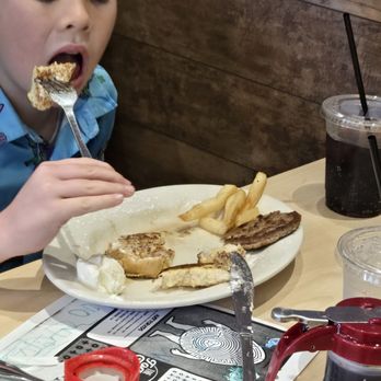 The Toasted Yolk Cafe - Kids French toast and some of daddy's French fries - Breakfast & Brunch Near Me - Houston, Texas The Toasted Yolk Cafe - Kids French toast and some of daddy's French fries - Breakfast & Brunch Near Me - Houston, Texas