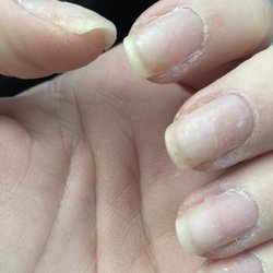 Poshe Salon & Spa - You can see the builder still on the nails and how rough they are. Red nail polish would have looked horrible on these.
