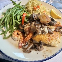 Pan seared Chilean Sea bass with Melissa on top. Pan seared Chilean Sea bass with Melissa on top.