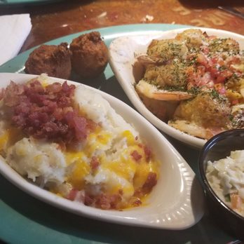 Fudpucker's - Stuffed shrimp, loaded mashed potatoes, pineapple coleslaw and hush puppies - Seafood Near Me - Destin, Florida