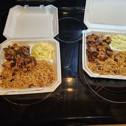 Spices Caribbean Restaurant & Bar - Oxtail with rice and beans with cabbage.