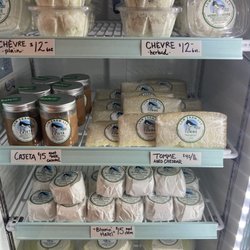 Lum Farm - Our cheese fridge is stocked (seasonally) with chevre, tomme, gouda, "bloomin' hazels" (aged chevre) and feta, not to mention cajeta.
