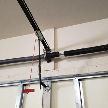 Monkey Garage Door Company - Busted spring on right - Garage Door Services Near Me - Tucson, Arizona Monkey Garage Door Company - Busted spring on right - Garage Door Services Near Me - Tucson, Arizona