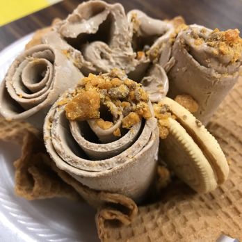 Rolled Ice Cream - Chocolate Ice Cream rolled and topped with Butterfingers. - Ice Cream & Frozen Yogurt Near Me - Orlando, Florida