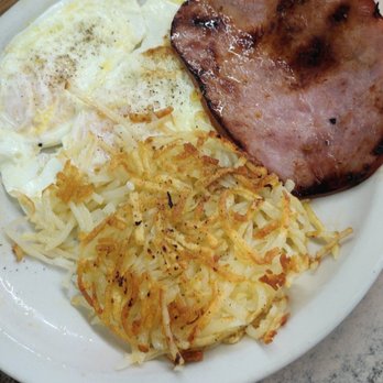 Mr. Quick - My boyfriend's biscuit & gravy platter; 2 overeasy eggs, hash browns & ham. - Breakfast & Brunch Near Me - Orlando, Florida