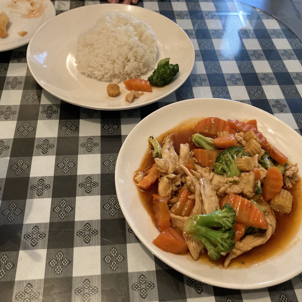 Jasmine Rice Thai Nakin - A plate of veggies and chicken cooked in sauce and some rice for our toddler! He enjoyed both. - Thai Near Me - Aiken, South Carolina Jasmine Rice Thai Nakin - A plate of veggies and chicken cooked in sauce and some rice for our toddler! He enjoyed both. - Thai Near Me - Aiken, South Carolina