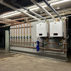 Mt Blue Mechanical - Dual propane boiler installation in large residential home