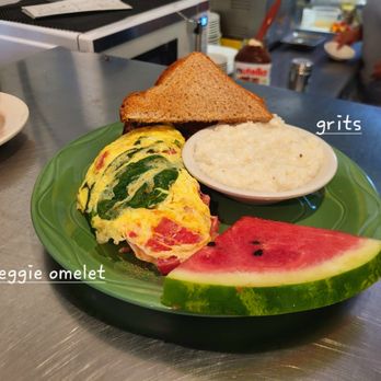 Lemon Leaf Cafe - an omelet and a slice of watermelon - Breakfast & Brunch Near Me - Largo, Florida Lemon Leaf Cafe - an omelet and a slice of watermelon - Breakfast & Brunch Near Me - Largo, Florida