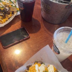 La Esquinita Pollos Asados - Asada fries and nachos