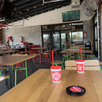 Hat Creek - Patio, TVs, big fans, playground is to the right. - Burgers Near Me - Katy, Texas Hat Creek - Patio, TVs, big fans, playground is to the right. - Burgers Near Me - Katy, Texas