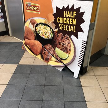 Pollo Campero - Huge broken sign sadly leaning against wall - Latin American Near Me - Laurel, Maryland