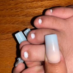 Se Se Nail Spa - Nails are not painted right and a cut where she filed my nail too short