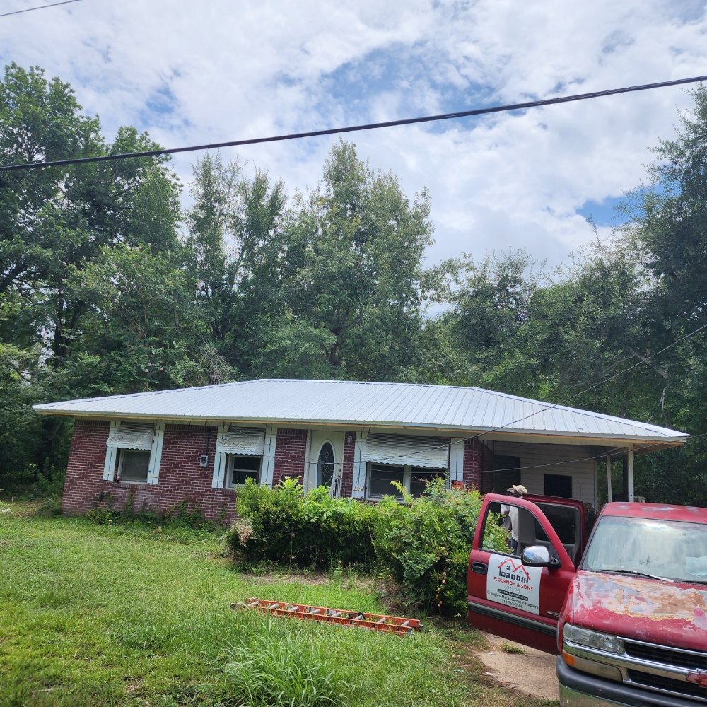 Slide of Flournoy and Sons Roofing