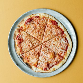 PYRO'S Fire Fresh Pizza - a pizza cut into eight slices - Pizza Near Me - Cordova, Tennessee PYRO'S Fire Fresh Pizza - a pizza cut into eight slices - Pizza Near Me - Cordova, Tennessee