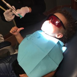 Art Of Modern Dentistry Pediatrics - All done! Thumbs up from Tucker!