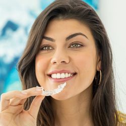 Summit Orthodontics - Patient with Clear Aligners Invisalign