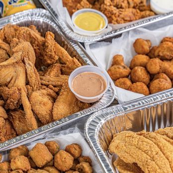 Captain Hook's - trays of fried chicken and dipping sauce - Seafood Near Me - Katy, Texas