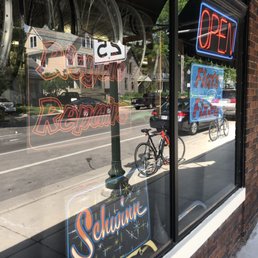 Great neighborhood bicycle shop - fun signs.