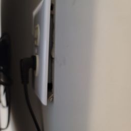 Needed wall outlet moved upward and over. This is how he left it. Said he'd follow up. No reply. Unprofessional Needed wall outlet moved upward and over. This is how he left it. Said he'd follow up. No reply. Unprofessional