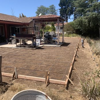 True Landscape - a concrete patio being built - Landscaping Near Me True Landscape - a concrete patio being built - Landscaping Near Me