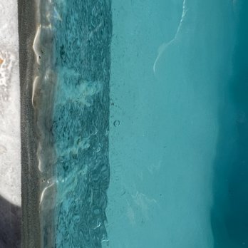 Kevin's Pools - Calcium deposits on tile. - Pool Cleaners Near Me Kevin's Pools - Calcium deposits on tile. - Pool Cleaners Near Me