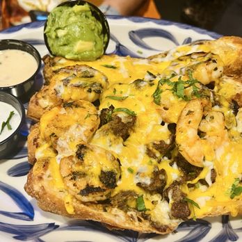 Dona Leti's - Surf & Turf eggrolls - Cocktail Bars Near Me - Houston, Texas