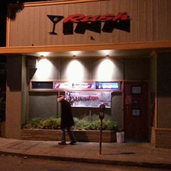 Rush Inn - a man standing in front of a restaurant - Bars Near Me - Santa Cruz, California Rush Inn - a man standing in front of a restaurant - Bars Near Me - Santa Cruz, California