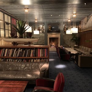 Photo of Maritime Hotel - New York, NY, United States. Cozy lobby area with fireplace