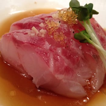 Uchi Austin - Sea bass crudo, orange oil, garlic, black pepper, citrus vinaigrette - Sushi Bars Near Me - Austin, Texas
