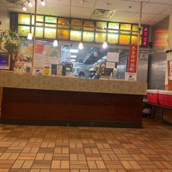 New China Hut - Front counter with everyone hard at work.