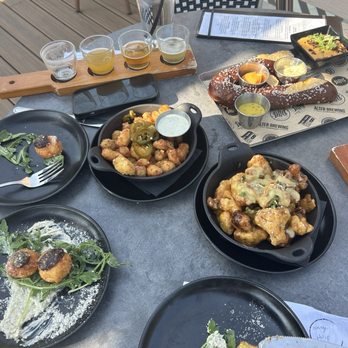 Alter Brewing + Kitchen - Far left - Polenta bites Middle - Jalapeño curds  Bottom right - Cauliflower bites Top right - Pretzel - Brewpubs Near Me - Oak Brook, Illinois