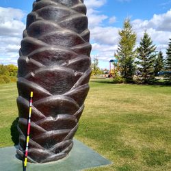 St Albert Kinsmen RV Park - This Acorn sculpture is close to St. Albert Kinsmen RV park and Ray Gibbon Drive going across the Sturgeon river. Along with a playground.