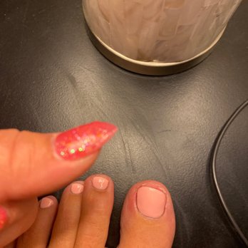 Amazing Nails Salon - Paint slapped on. If I could take a pic of my thumb nails. you'd see how much longer one is than the other - Nail Salons Near Me - Reno, Nevada