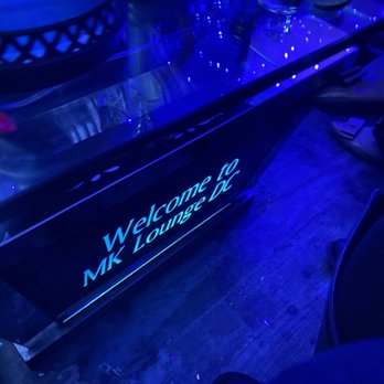 MK Lounge - MK sign at the tables upstairs! - Sports Bars Near Me - Washington, DC, District of Columbia