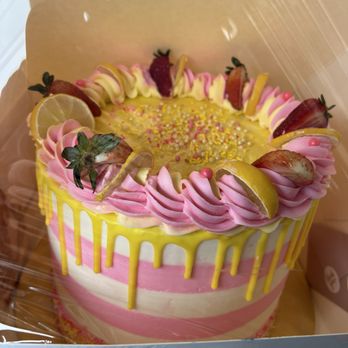 Avila Bakery - Strawberry-Lemon swirl cake. Filling: half is lemon creme, the other half, strawberries and cream. 100% work of art. - Desserts Near Me