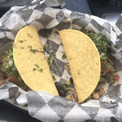 Loco Hombres - Pork tacos with black beans, rice, cilantro, medium hot sauce. Delicious! Came in an order of 3.