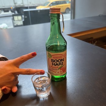 Let's Meat - Peach Soju bottle while we waited to be seated - Korean Near Me - New York, New York