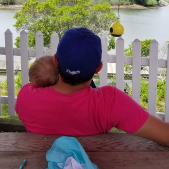 Edd's Place - Baby boy slept until he smelled the food, but Dad enjoyed the snuggles while taking in the view and waiting on food. - American Near Me - Westbrook, Connecticut