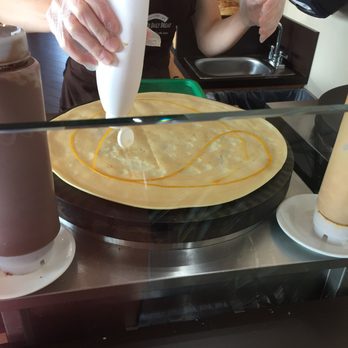 Minot's Daily Bread - Cheesecake crepe with fresh strawberry and mango sauce - Bakeries Near Me - Minot, North Dakota