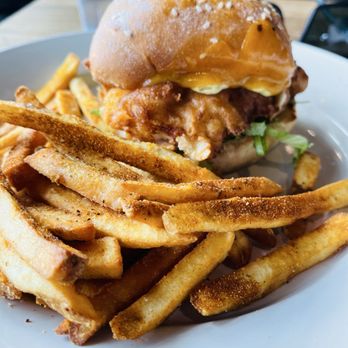 Goose Port - Fish Fish-O-Filet Sandwich with Old Bay Fries - Sports Bars Near Me - Roseville, California Goose Port - Fish Fish-O-Filet Sandwich with Old Bay Fries - Sports Bars Near Me - Roseville, California