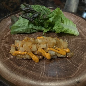 XO Restaurant - Pickled radish and thinly sliced pork belly with a lettuce wrap - Asian Fusion Near Me - Honolulu, Hawaii XO Restaurant - Pickled radish and thinly sliced pork belly with a lettuce wrap - Asian Fusion Near Me - Honolulu, Hawaii