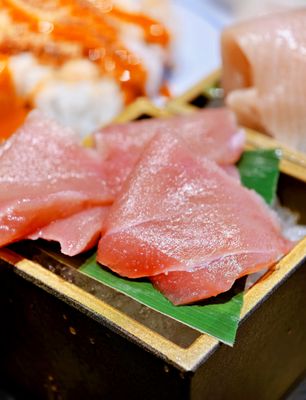 Kura Revolving Sushi Bar by null