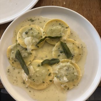 Taverna - Ravioli stuffed with ricotta and spinach in a sage and butter sauce. - Italian Near Me - Austin, Texas Taverna - Ravioli stuffed with ricotta and spinach in a sage and butter sauce. - Italian Near Me - Austin, Texas