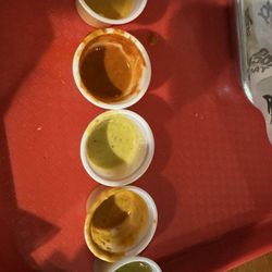 Rocky Mountain Taco - Salsa from the top. Hot, medium, mild sour cream, chipotle sour cream, mild.