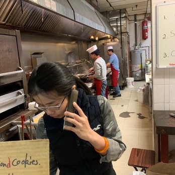 Ho Ho Kitchen - a woman talking on her cell phone - Chinese Near Me - Chester, New Jersey Ho Ho Kitchen - a woman talking on her cell phone - Chinese Near Me - Chester, New Jersey