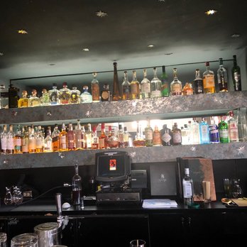 Coyote Cafe - Sat at the bar as we had no reservations.  Turned out to be a perfect spot.  Bartender made us awesome drinks too! - New American Near Me - Santa Fe, New Mexico