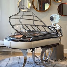 From a gallery that sold very artistic pianos. From a gallery that sold very artistic pianos.